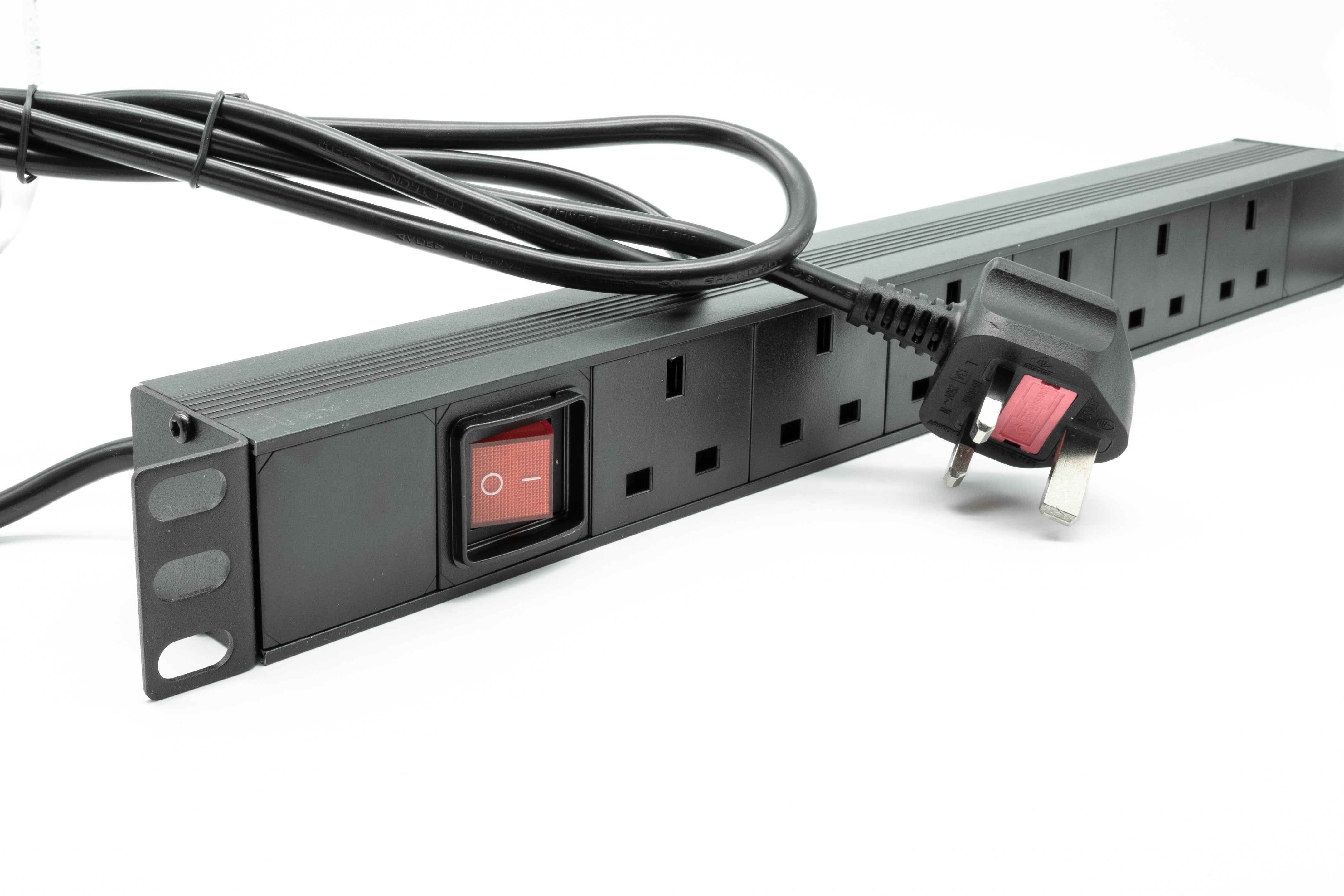 Full length slanting view of a 1U 19" 6 Way Switched Horizontal 13A UK Sockets to UK Plug Rack PDU showing its tied up power flex cord and plug.