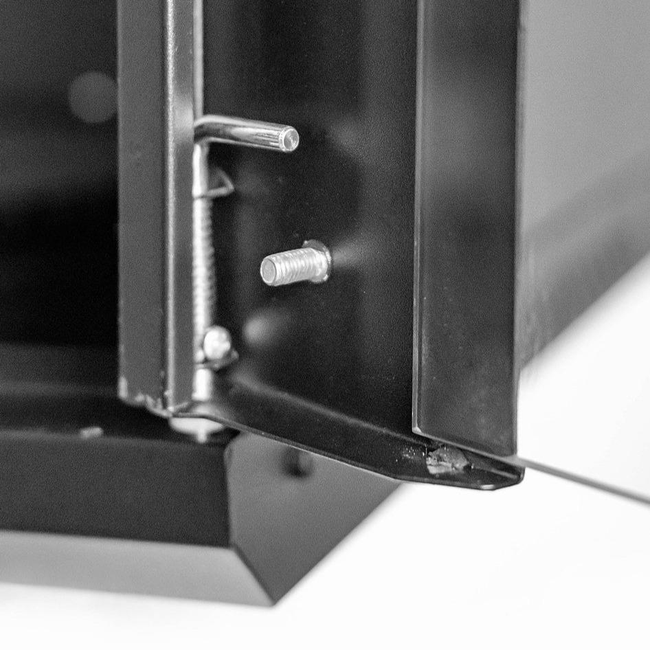 Lower right inner corner view of a black 9U 450mm-Deep Wall mount Network Cabinet  showing its door's bottom hinge.